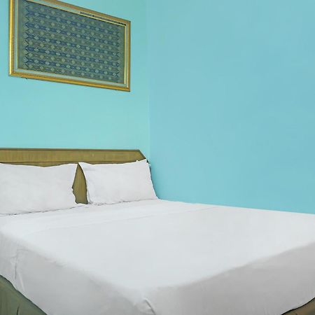 Super Oyo Collection O 92690 Hotel Limas Palembang Bagian luar foto