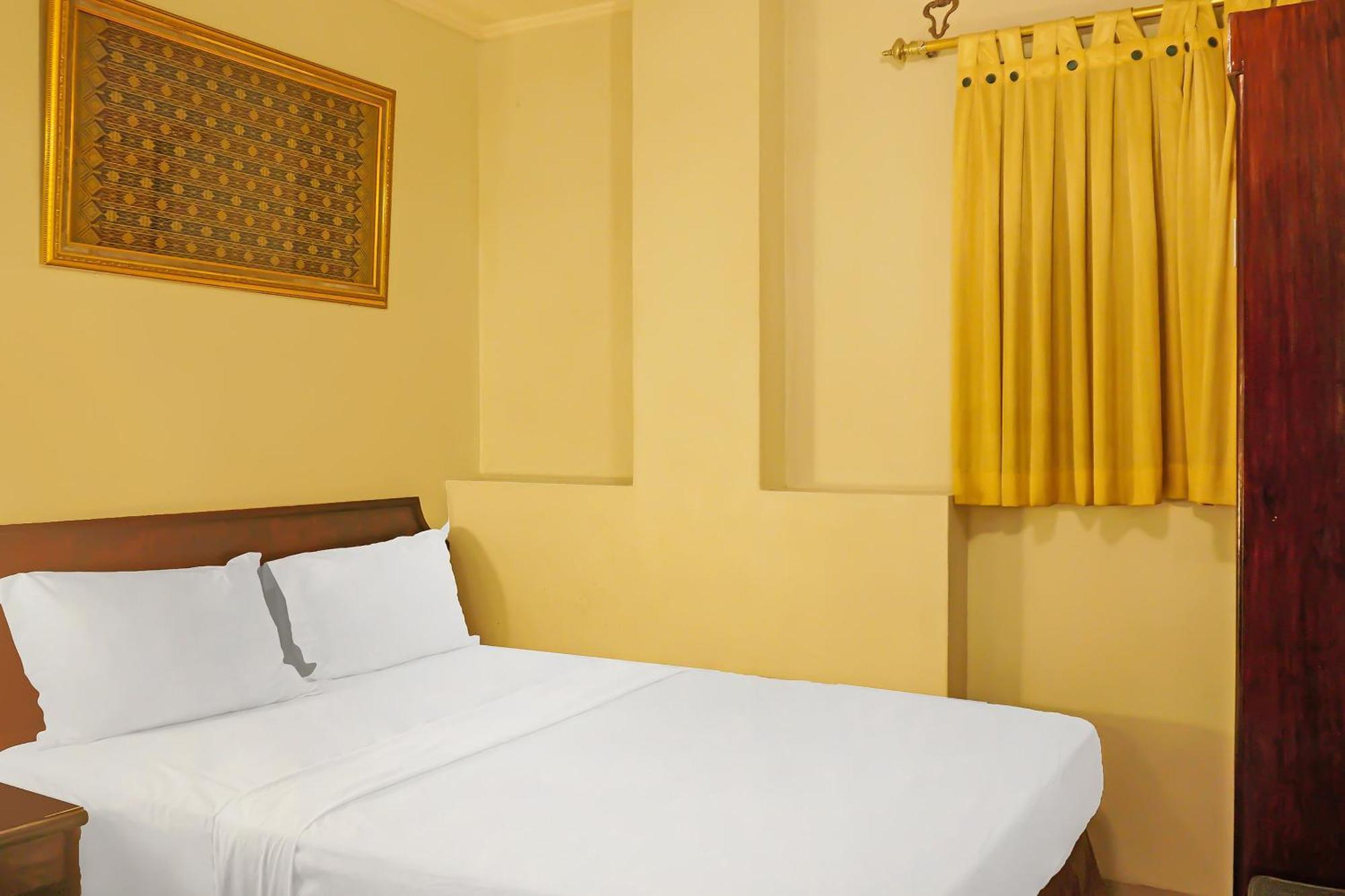 Super Oyo Collection O 92690 Hotel Limas Palembang Bagian luar foto