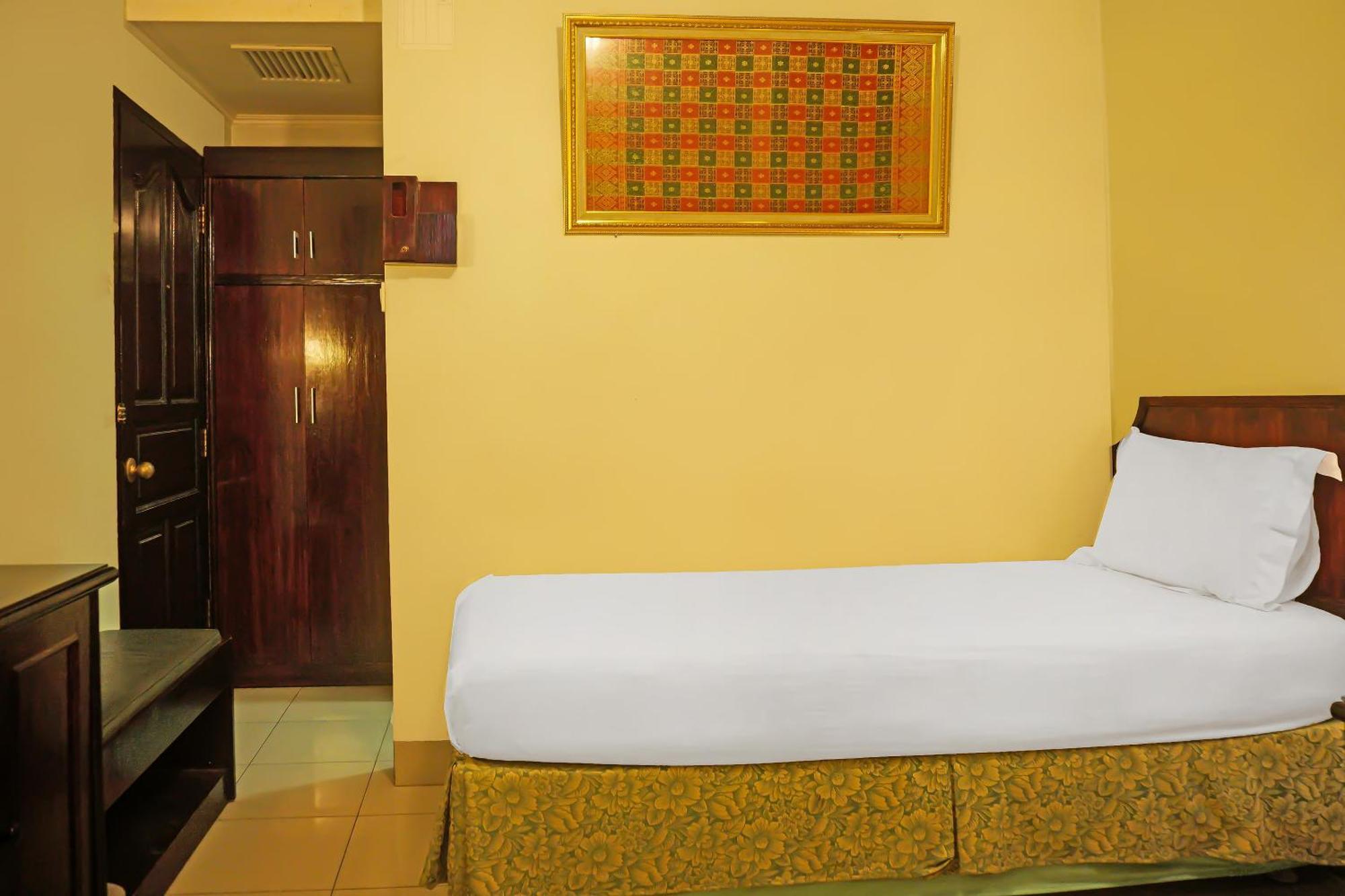 Super Oyo Collection O 92690 Hotel Limas Palembang Bagian luar foto