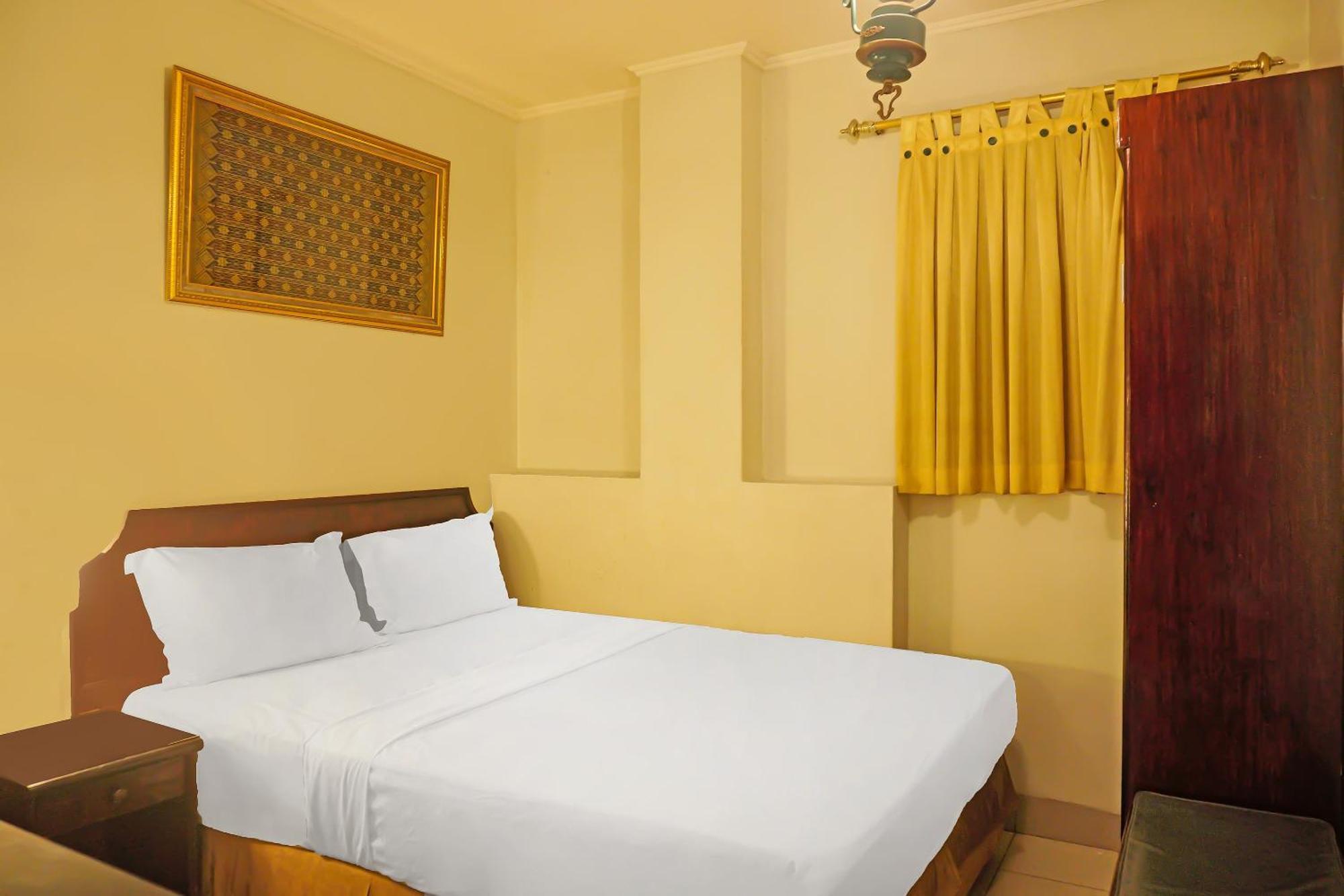 Super Oyo Collection O 92690 Hotel Limas Palembang Bagian luar foto