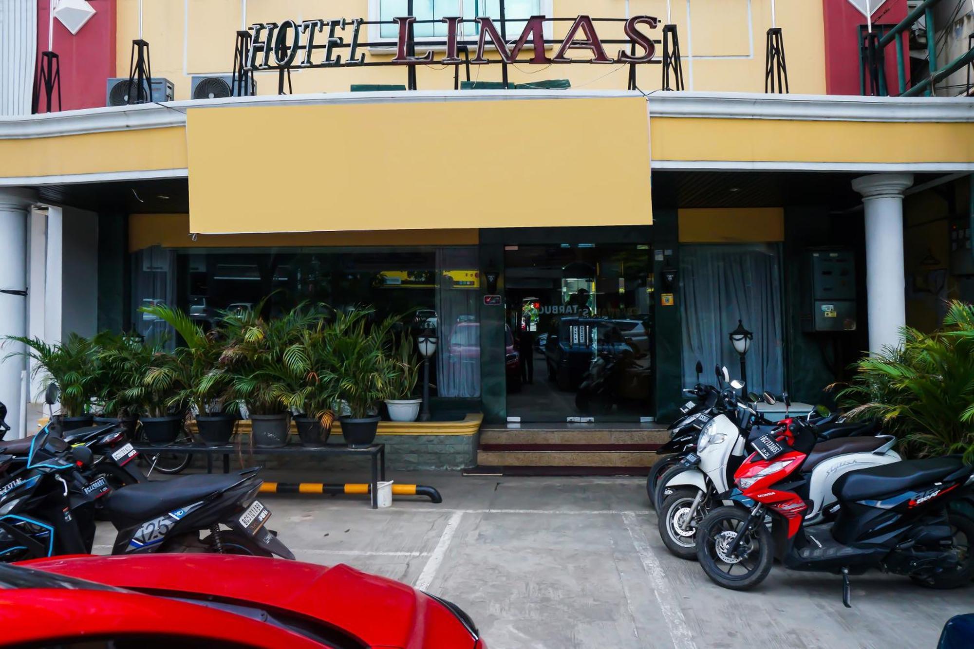 Super Oyo Collection O 92690 Hotel Limas Palembang Bagian luar foto