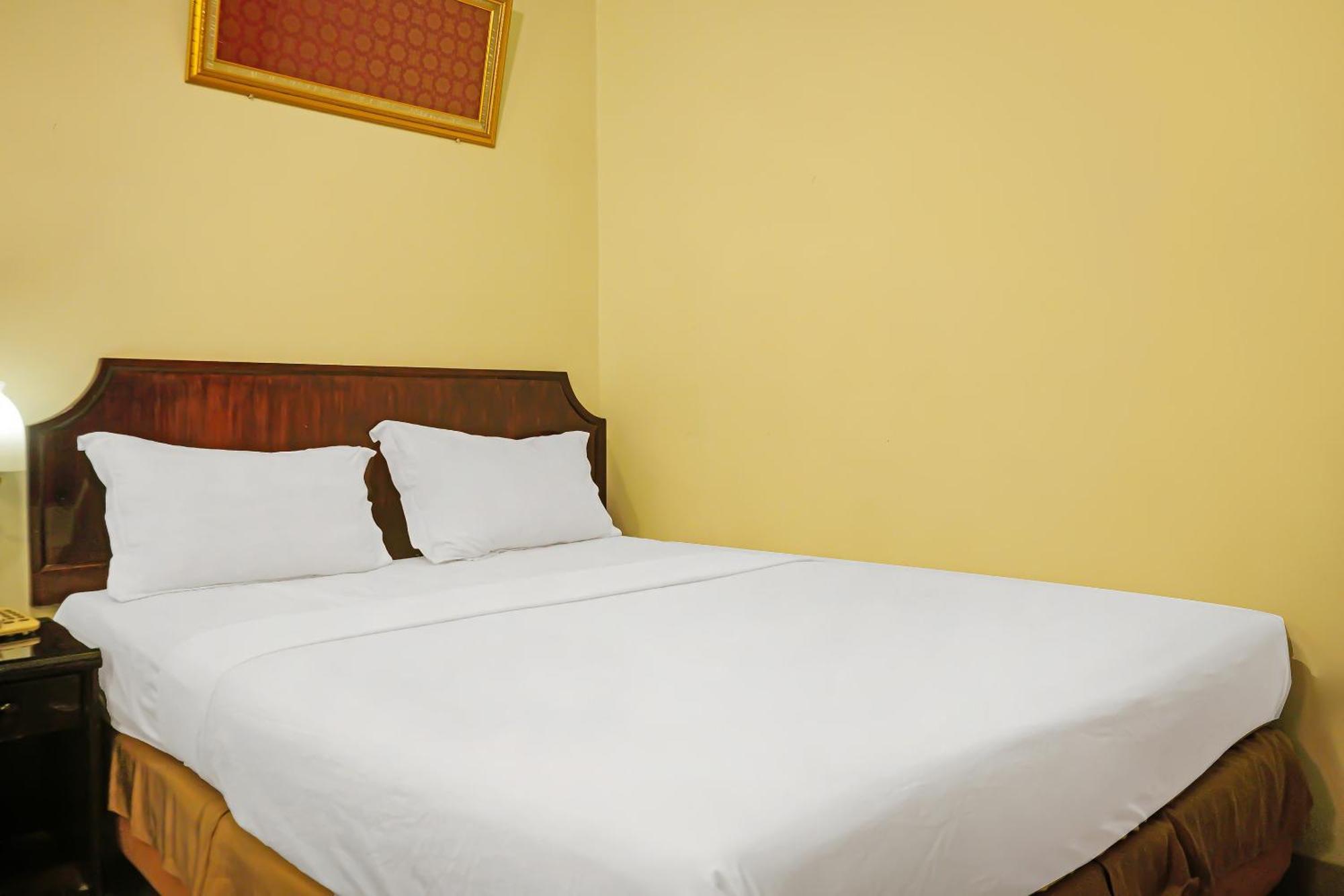 Super Oyo Collection O 92690 Hotel Limas Palembang Bagian luar foto