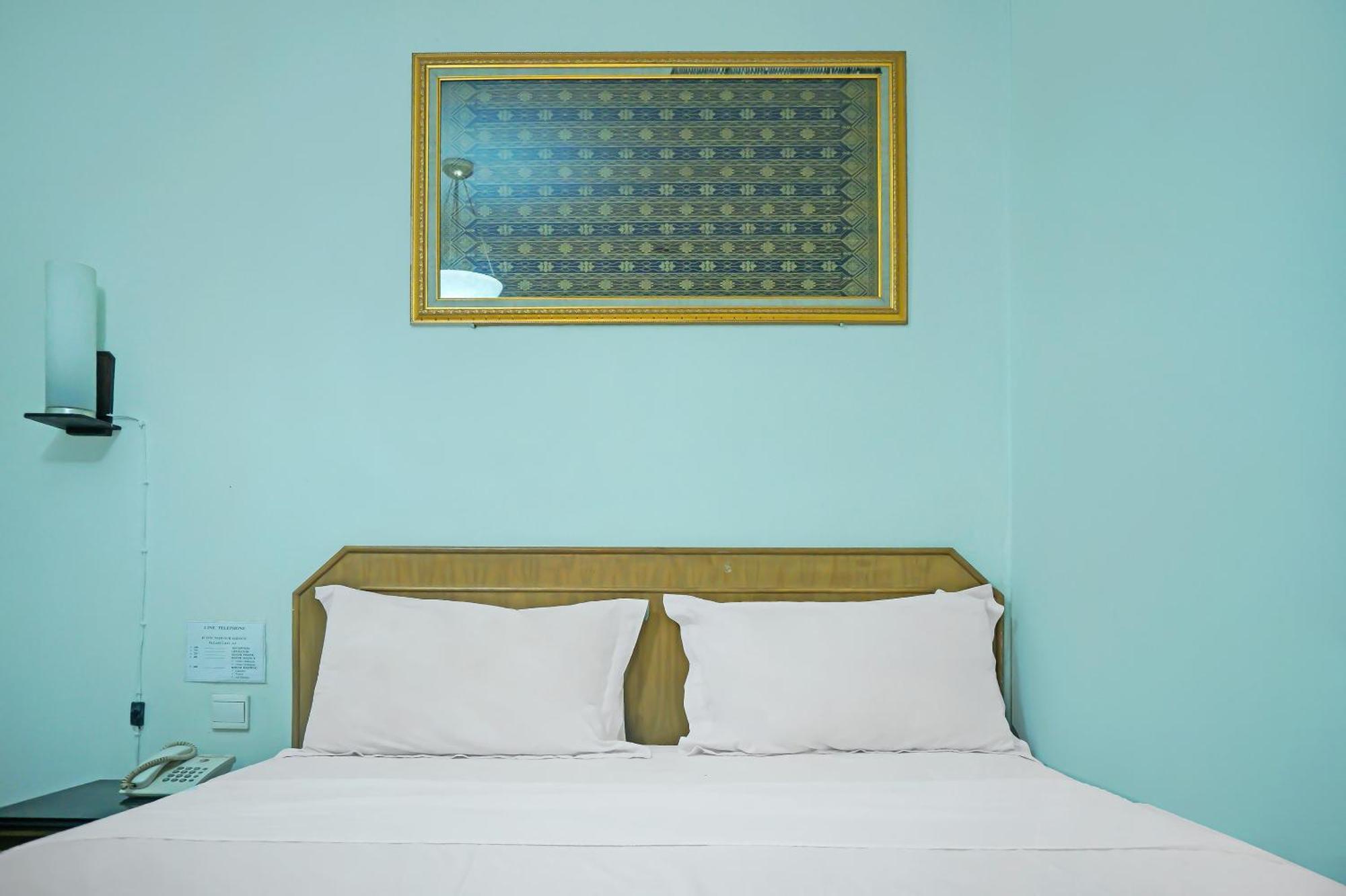 Super Oyo Collection O 92690 Hotel Limas Palembang Bagian luar foto
