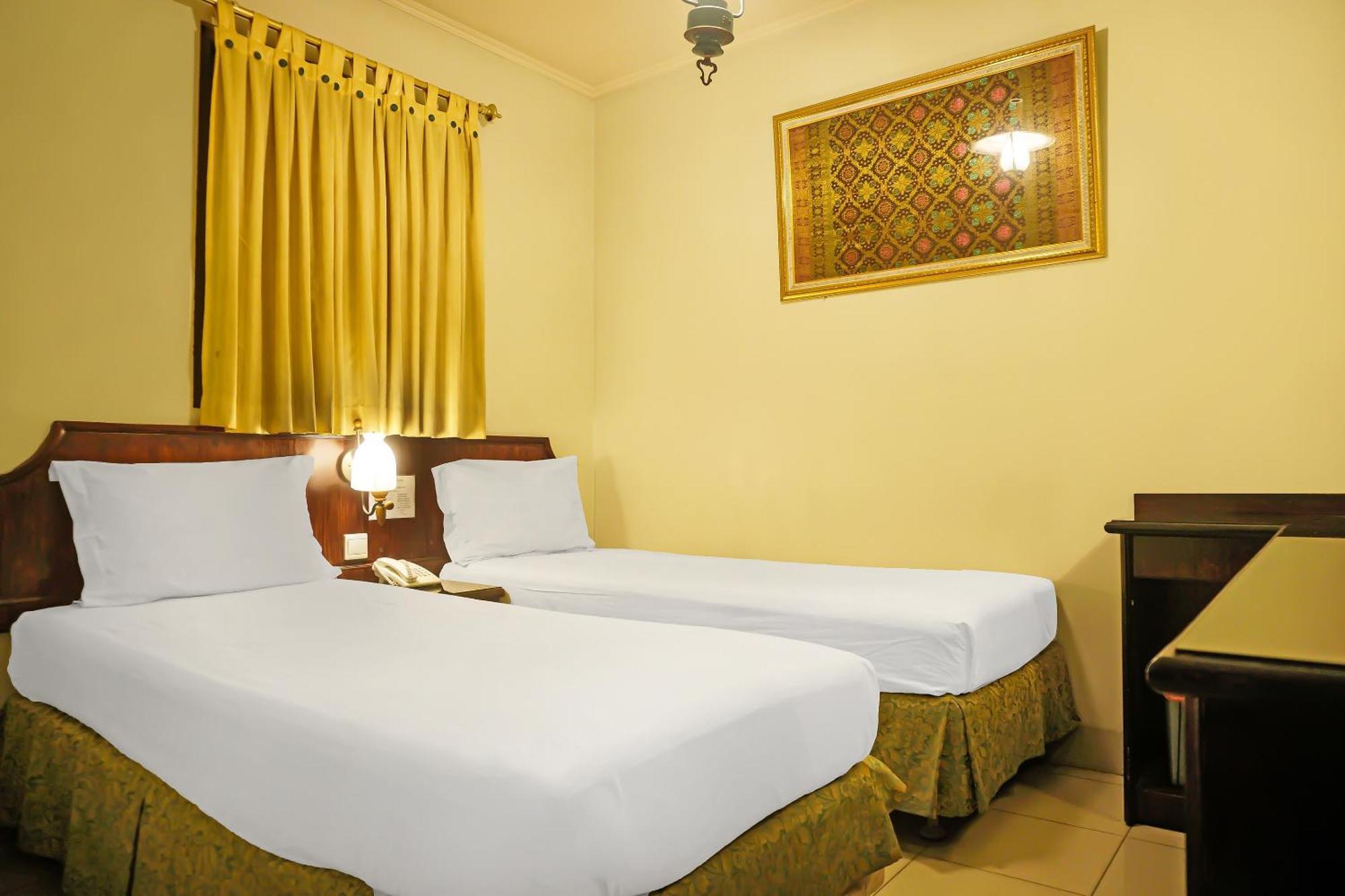 Super Oyo Collection O 92690 Hotel Limas Palembang Bagian luar foto