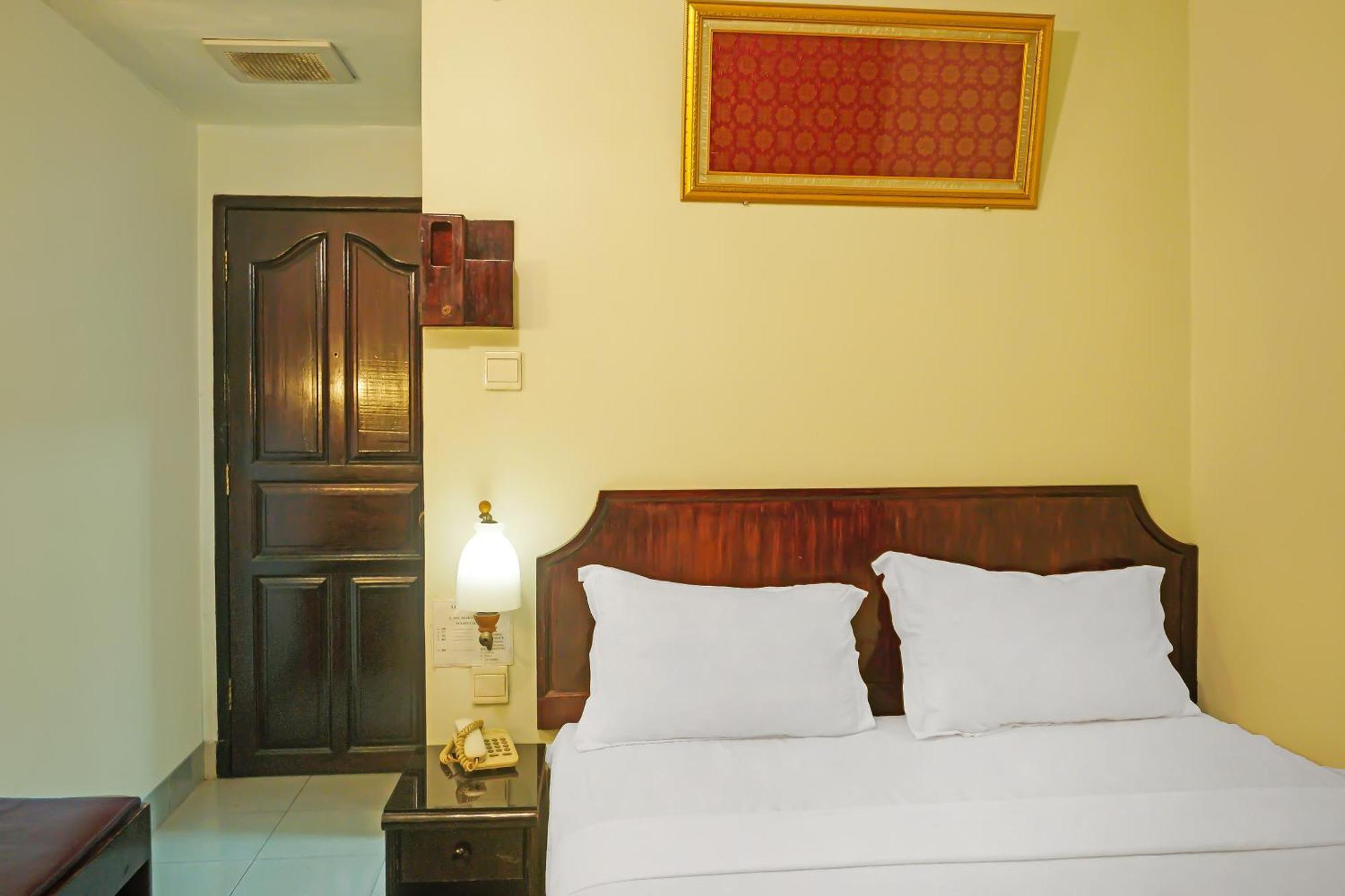 Super Oyo Collection O 92690 Hotel Limas Palembang Bagian luar foto