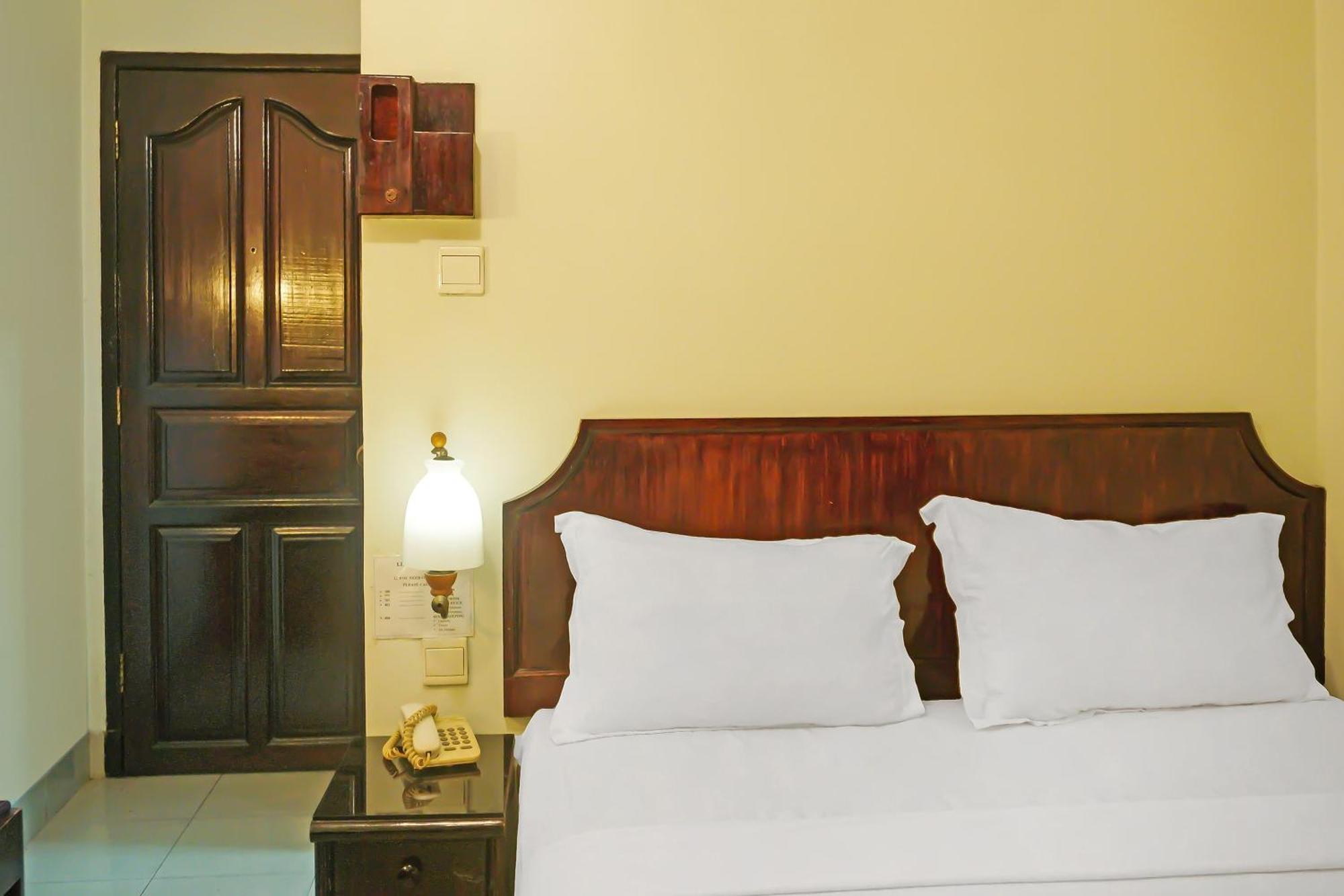 Super Oyo Collection O 92690 Hotel Limas Palembang Bagian luar foto