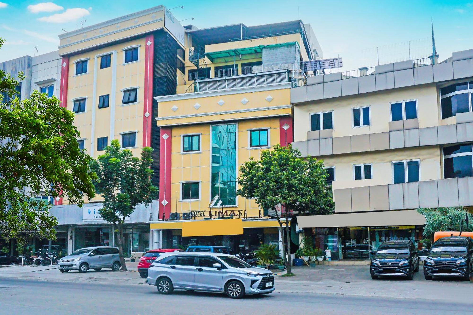 Super Oyo Collection O 92690 Hotel Limas Palembang Bagian luar foto